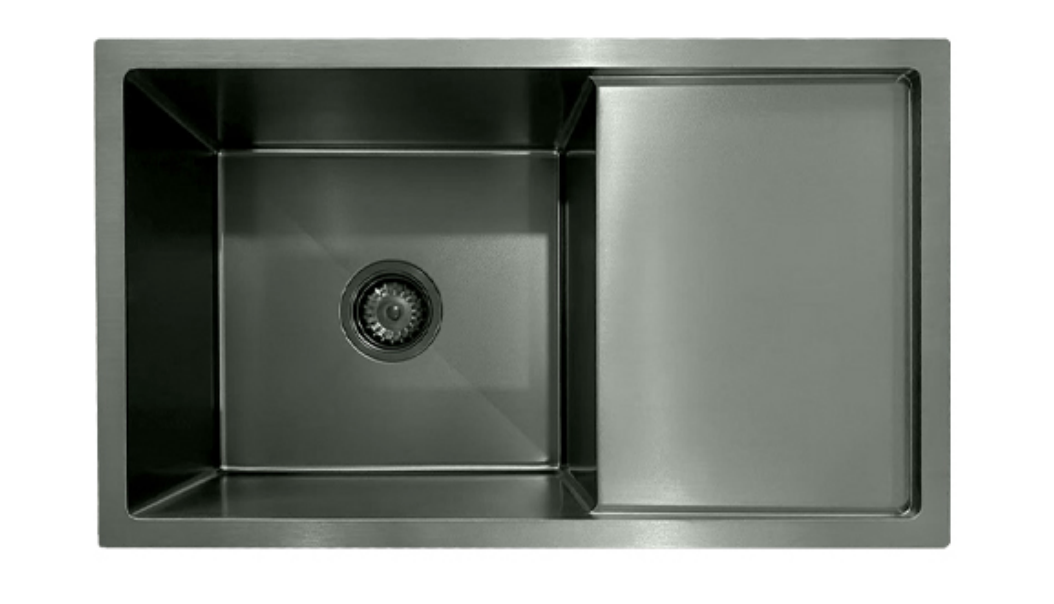 Gunmetal black stainless steel single bowl kitchen sink with integrated drainboard.