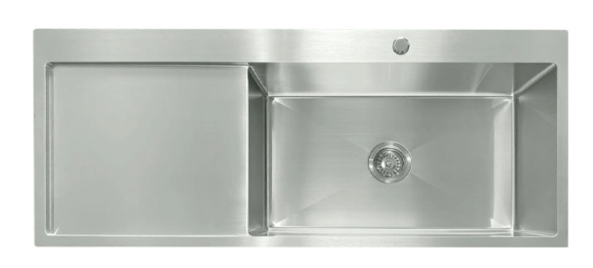 Modern silver stainless steel kitchen sink with single bowl and integrated left-side drainboard.