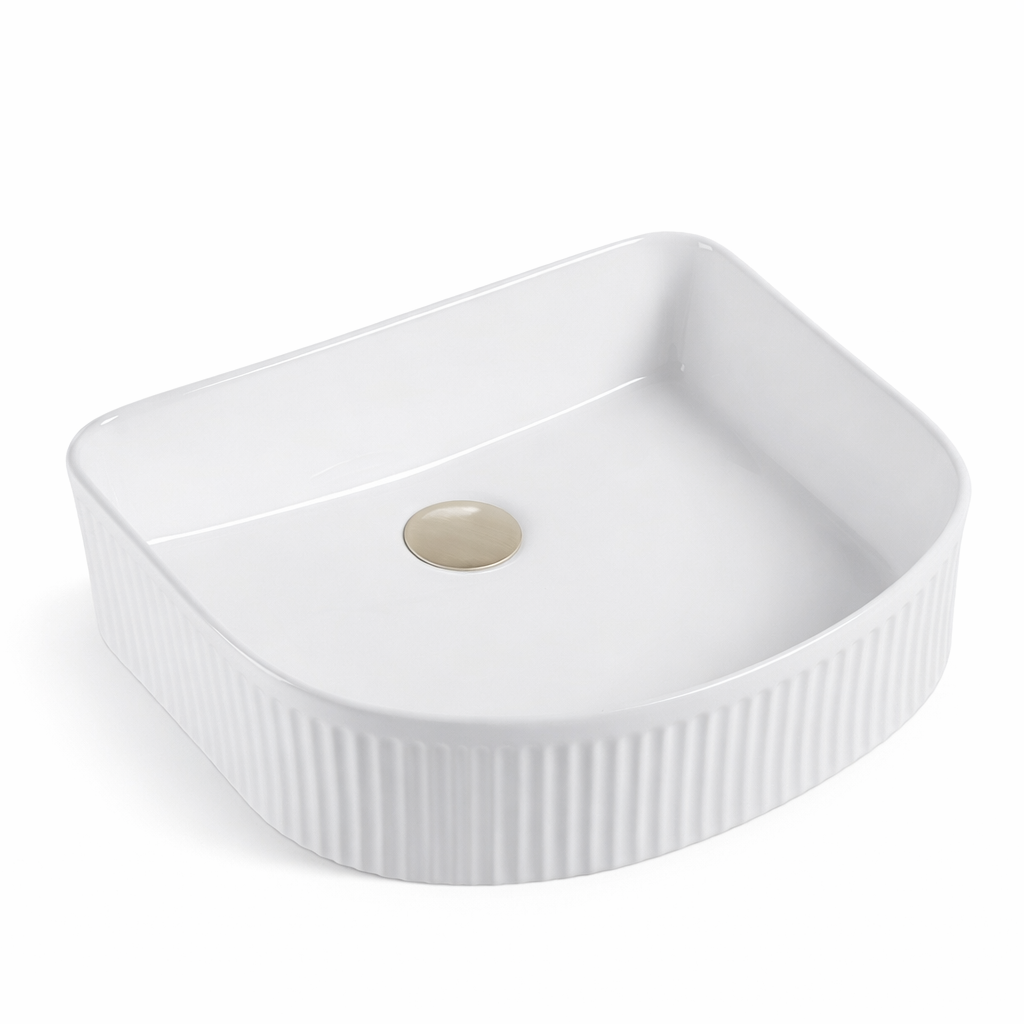Modern rectangular white fluted vessel sink with brushed nickel drain for bathroom vanity.