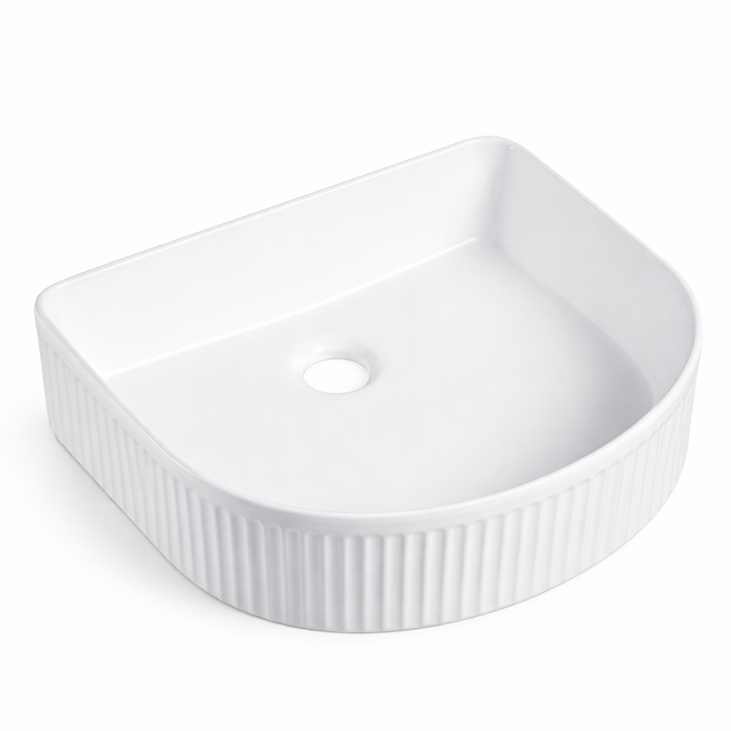 White fluted ceramic vessel sink, D-shaped bathroom basin with ribbed exterior texture.