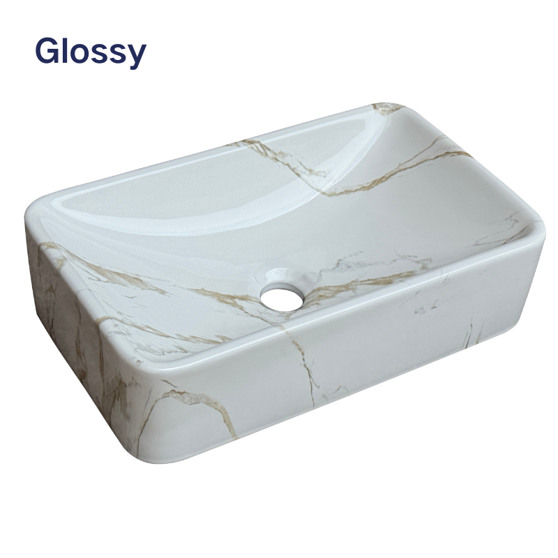 Glossy white rectangular vessel sink with gold marble veining for bathroom vanity.