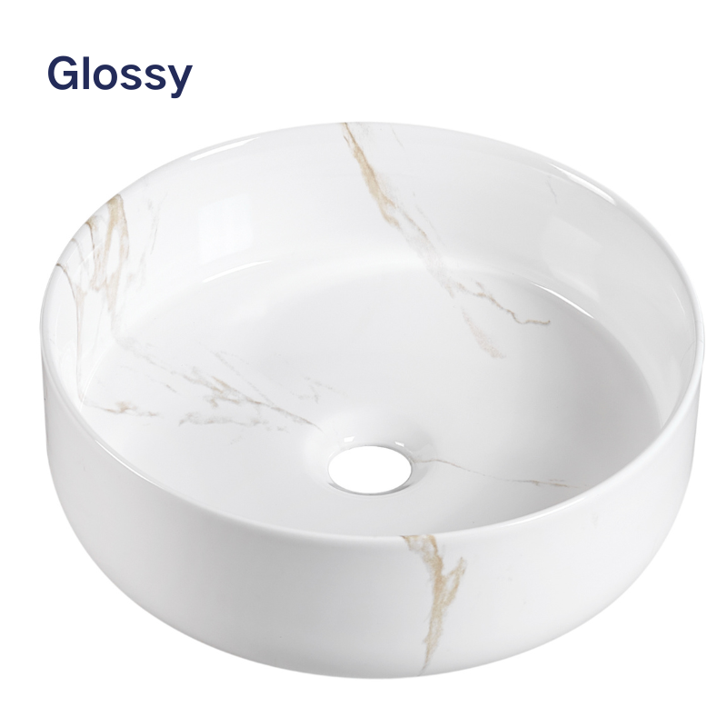 Glossy white round ceramic vessel sink with gold marble veining for bathroom.