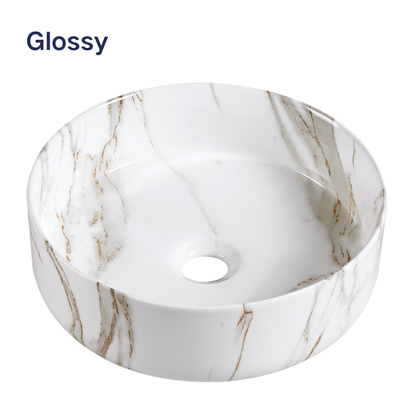 Round glossy white ceramic bathroom vessel sink with an elegant marble pattern and brown veining.