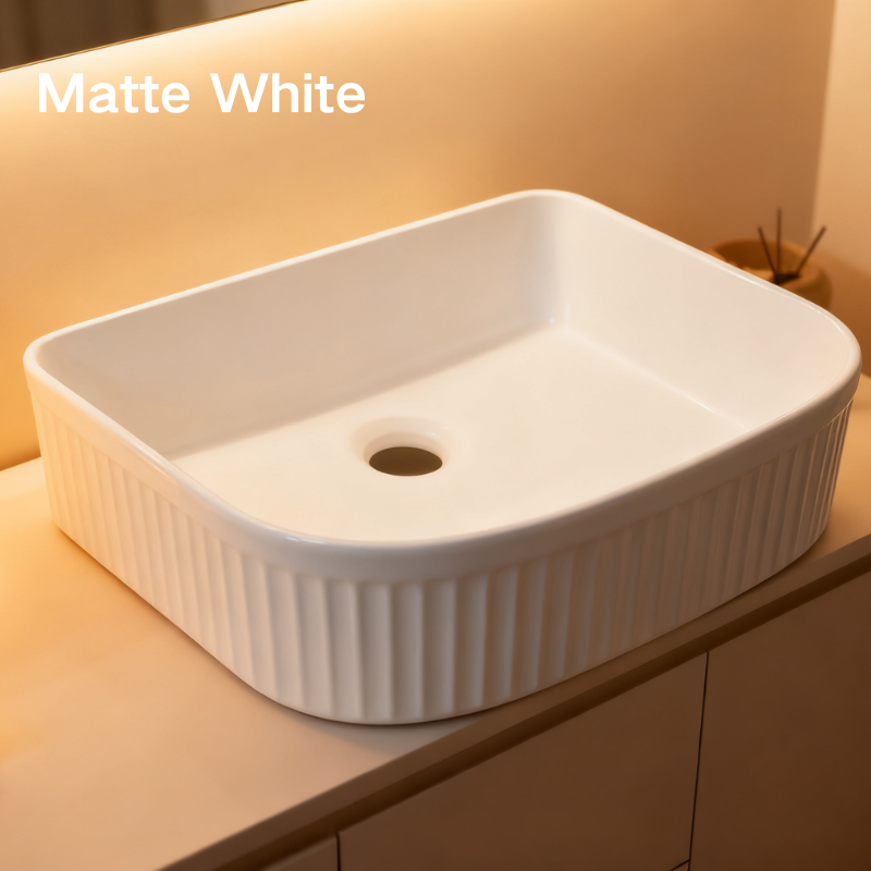 Modern matte white rectangular fluted vessel sink for bathroom vanity.