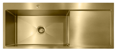 Gold single bowl kitchen sink with integrated drainboard and honeycomb textured base.