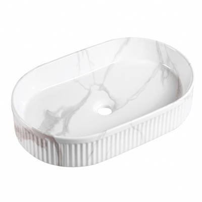 Oval white marble vessel sink with fluted exterior and grey veining for modern bathroom vanities.