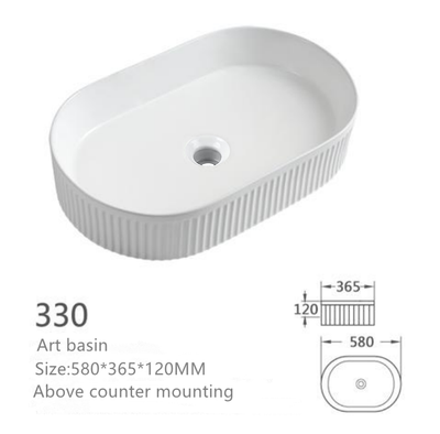 White oval fluted vessel sink, above counter mounting ceramic art basin for modern bathrooms.