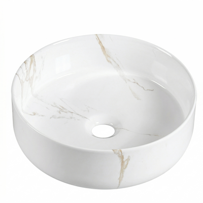 Modern round white ceramic vessel sink with elegant gold marble veining for bathroom vanity.