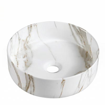 Round white ceramic vessel sink with brown marble veining, above-counter bathroom basin.
