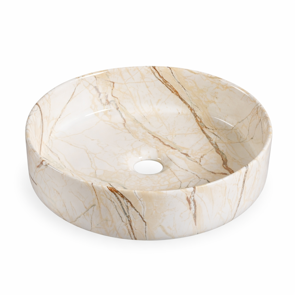 Round cream marble-effect ceramic vessel sink, modern above-counter bathroom washbasin.