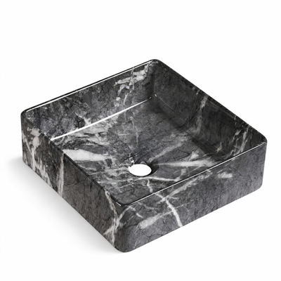 Square dark gray marble vessel sink with white veining, modern stone bathroom basin.