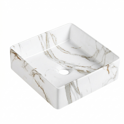 Square white marble ceramic vessel sink with brown veining for modern bathroom vanity.
