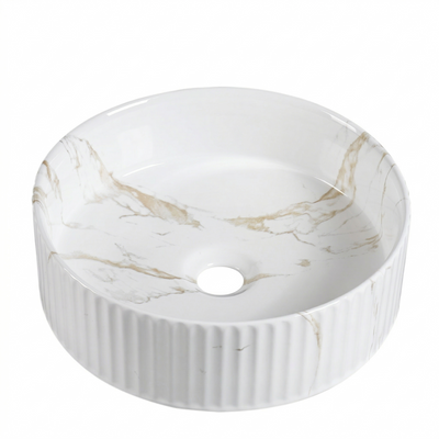 White marble round vessel sink with gold veining and fluted exterior for modern bathroom vanity.