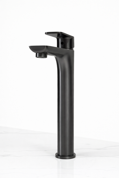 Modern matte black single-handle vessel sink faucet on a white marble countertop.