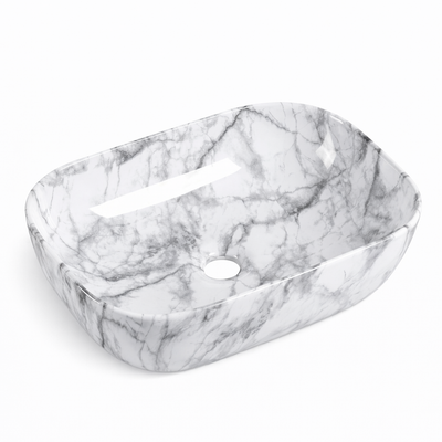 Rectangular white marble bathroom vessel sink with grey veining for modern above-counter installation.
