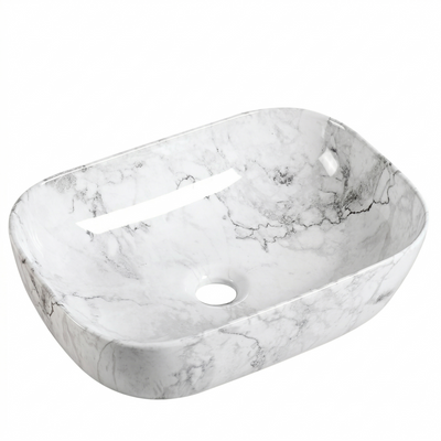 Modern white marble vessel sink with grey veining, rectangular ceramic above-counter bathroom basin.