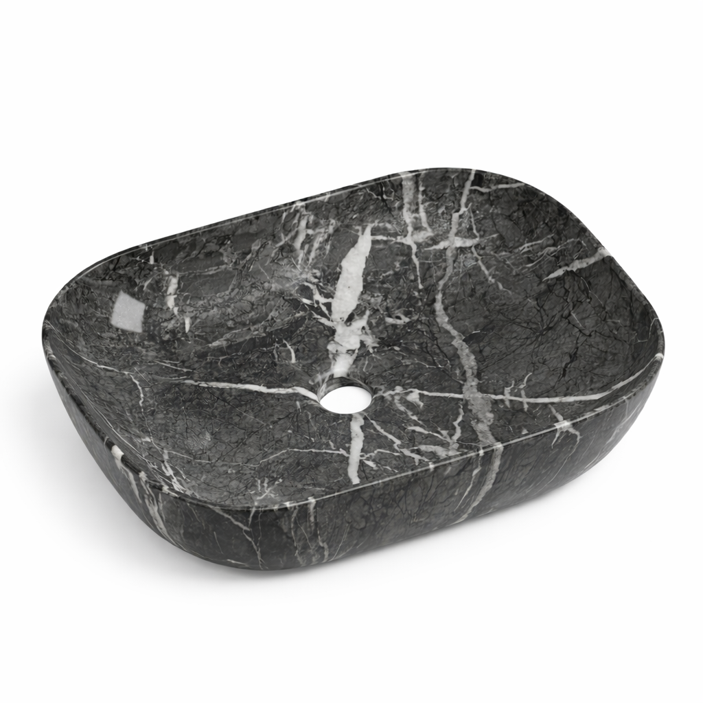 Rectangular black marble vessel sink with white veining, above-counter bathroom washbasin.