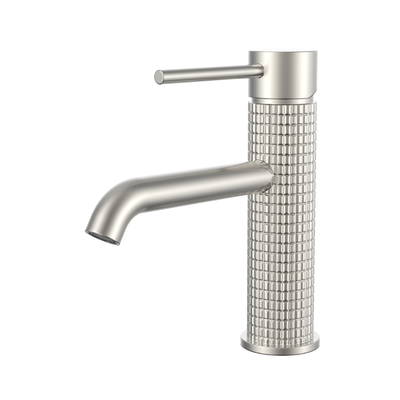 Modern brushed nickel single handle bathroom faucet with textured knurled body on white background.