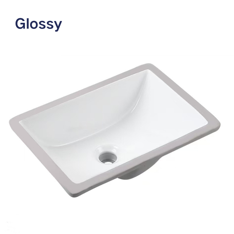 Glossy white rectangular ceramic bathroom sink basin with center drain by Bistone Builders Warehouse.