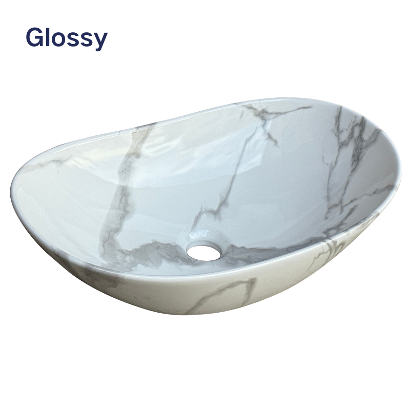 Glossy white marble vessel sink with grey veining, asymmetrical oval ceramic bathroom washbasin.