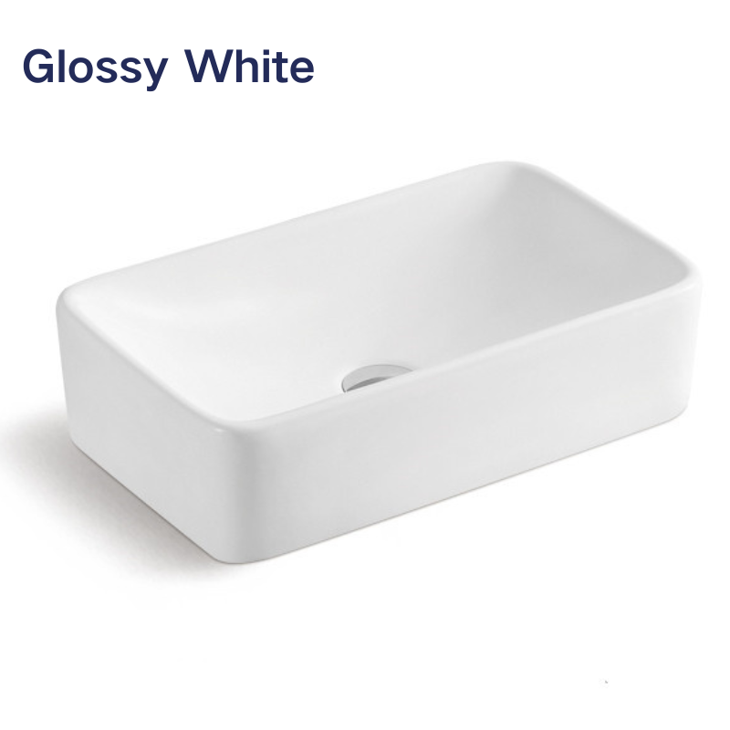 Rectangular glossy white ceramic vessel sink for modern bathroom vanity.