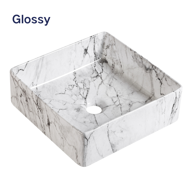 Glossy white marble square vessel sink, modern ceramic bathroom washbasin with grey veining.