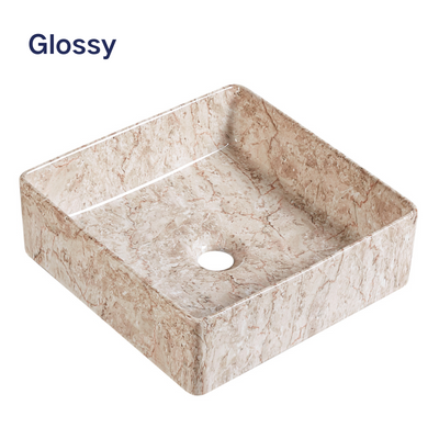 Glossy square beige marble vessel sink with brown veining for modern bathroom vanity.