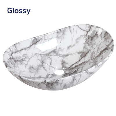 Glossy white and grey marble pattern oval vessel sink for modern bathroom vanity.